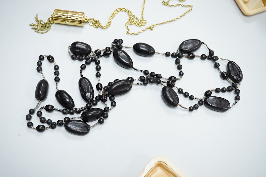 Two coral necklaces and a group of costume jewels, comprising: two coral bead necklaces, each with a gold clasp, combined gross weight approximately 35 grams; together with a simulant pearl necklace and pair of earrings